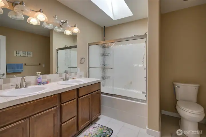 Between the bedrooms is the full guest bathroom.