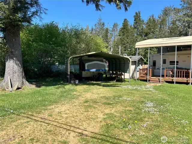 Additional carport and shed.
