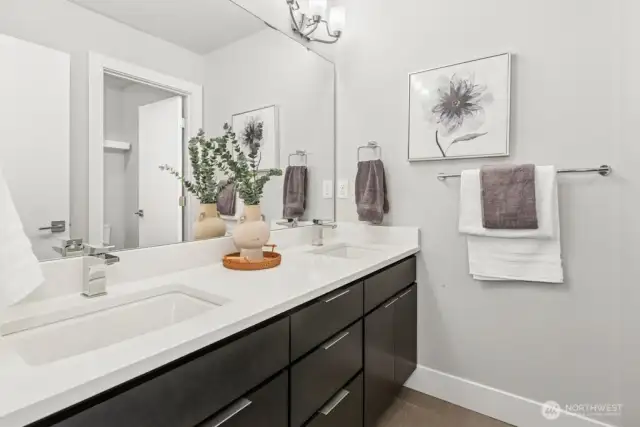 quartz counters and tile floor in main bath too