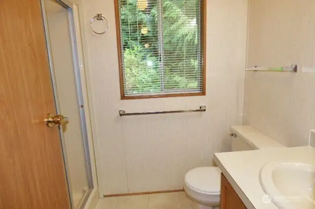 Just down the hall is the guest bathroom.