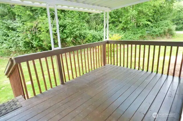 Covered deck in the back yard.
