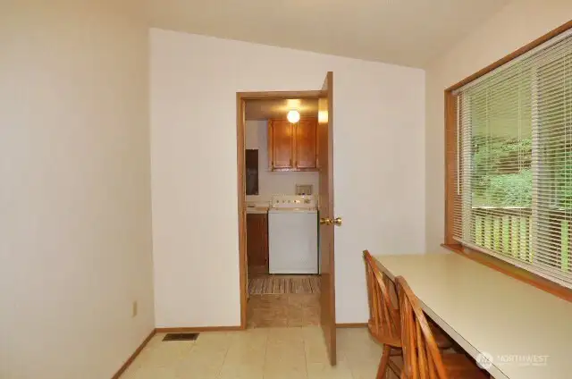 Area right off the kitchen could be used as eating area, 'den', or storage.