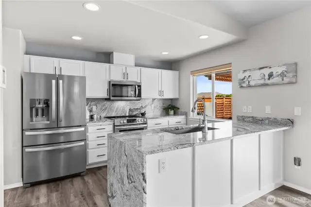 Kitchen with stainless steel appliances.