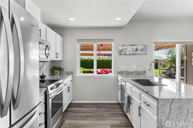 Kitchen with granite countertops.
