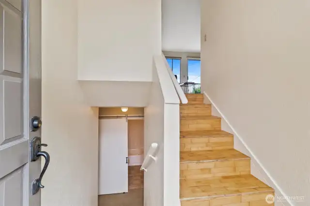 Split level entry with hardwood landing and stairs