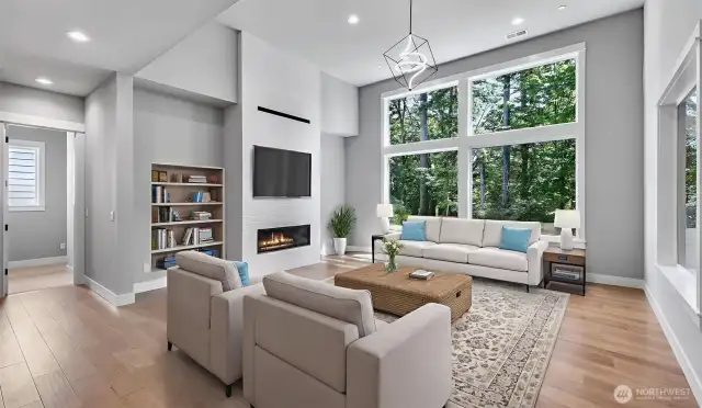 Soaring 14' ceiling puts the "great" in Great Room! Doorway to the left in this photo leads to private Guest Suite with attached 3/4 Bath. Virtually staged.