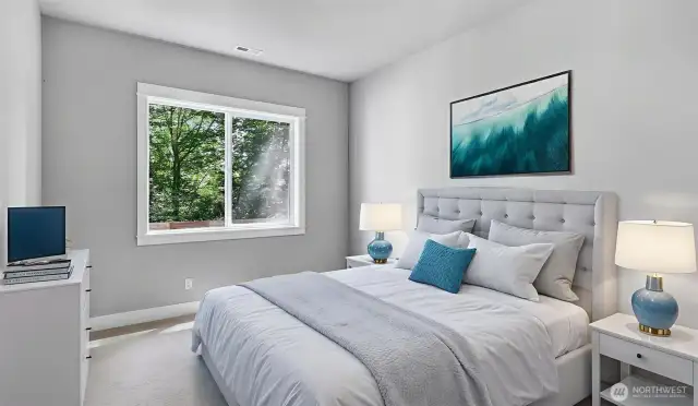 Guest Suite on the Main Level, ideal for multi-generational living, or extended stay guests. Virtually staged.