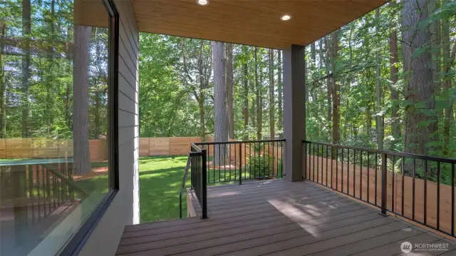 Covered deck is perfect for year-round enjoyment.