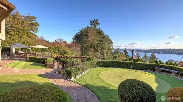 Putting green with lake view