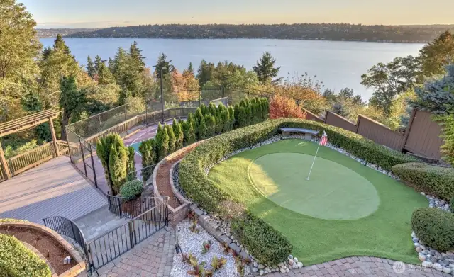 Putting green with lake view