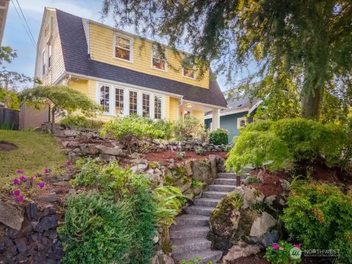 This stunning Dutch Colonial has been revitalized with an extraordinary renovation. It sits high on the hill providing abundant light and fantastic privacy.