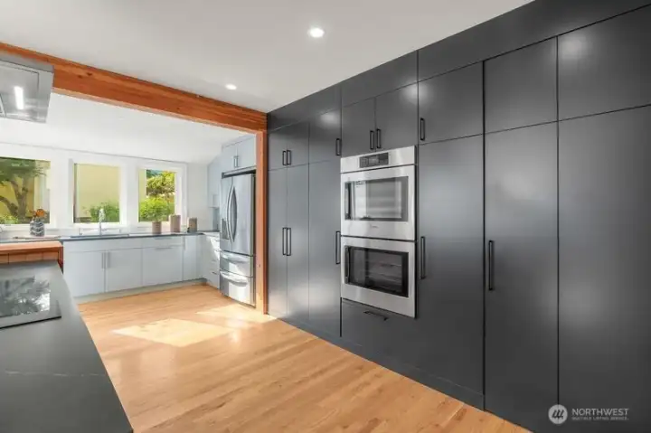 This award-winning kitchen was designed by JOSH Architect and built by Gaspars. This elegant wall of cabinets is sleek and so functional!