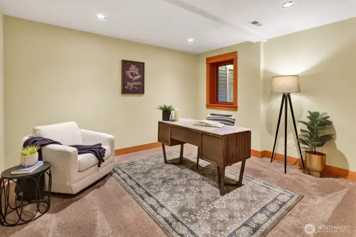 One of the three lower level bedrooms is currently set up as an office