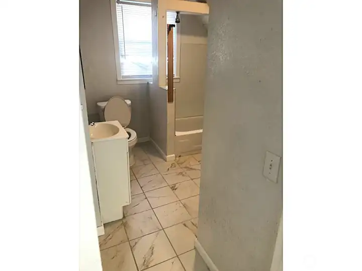 Unit One 1b1b - bathroom with private laundry
