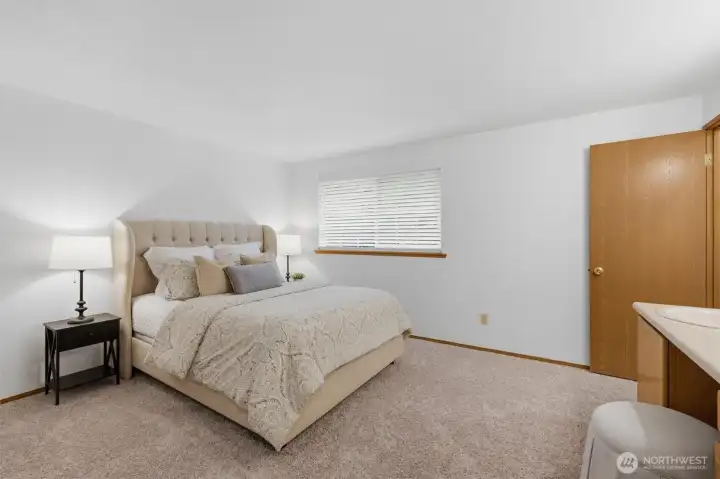 Primary bedroom with walk-in closet.