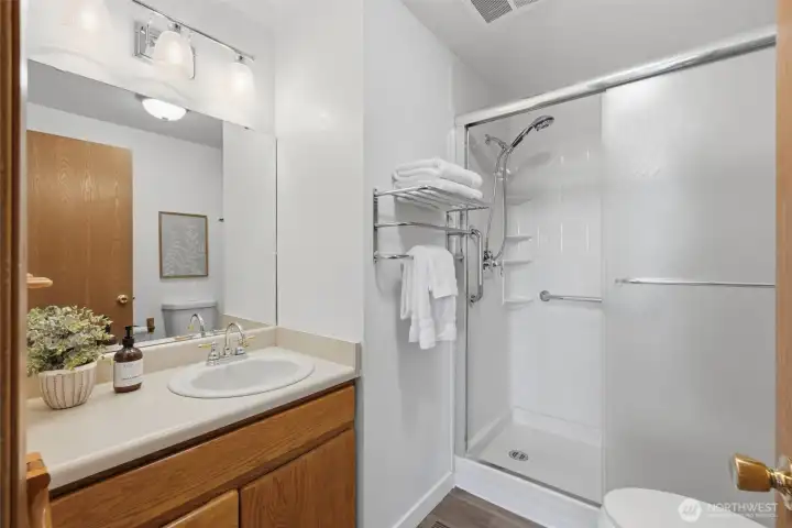 3/4 Bathroom off the hallway with NEW shower and toilet.