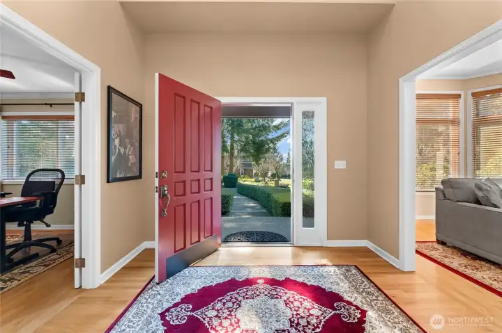 Making a grand impression, this foyer accentuates this home's beautifully open layout concept.