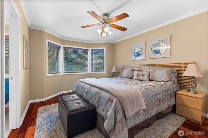 Third bedroom complimented with it's own gorgeous window nook and en-suite shared bathroom.