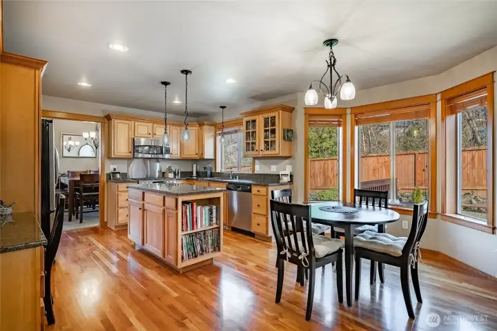 Light and bright, open kitchen, cherry floors, granite counters, access to formal dining room, breakfast nook and family room