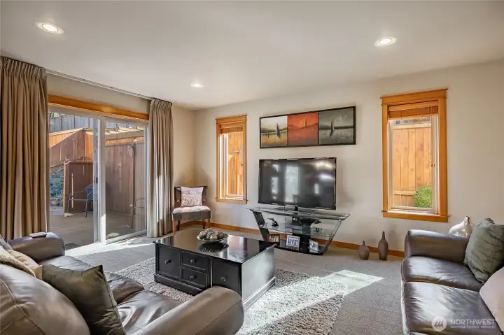 Family room off the kitchen with sliders to back deck