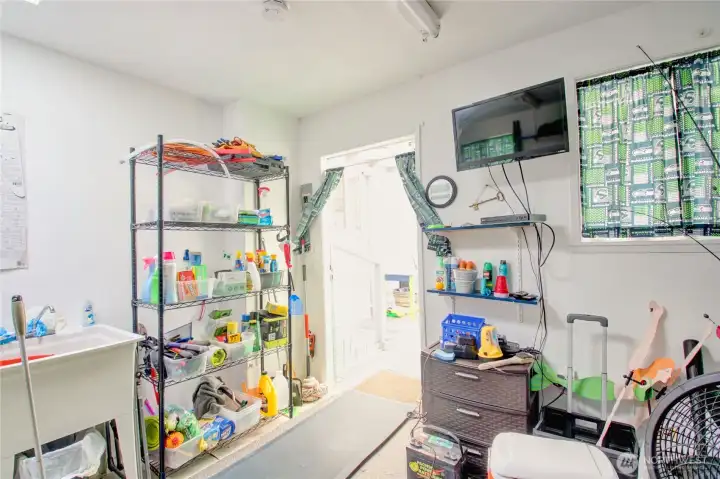 Flex room with utility sink, use this room for storage or whatever you need