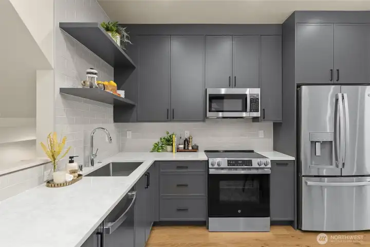 Smart storage, custom cabinetry, and a streamlined layout make cooking and entertaining a breeze.