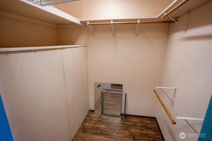Walk in closet off of primary bed
