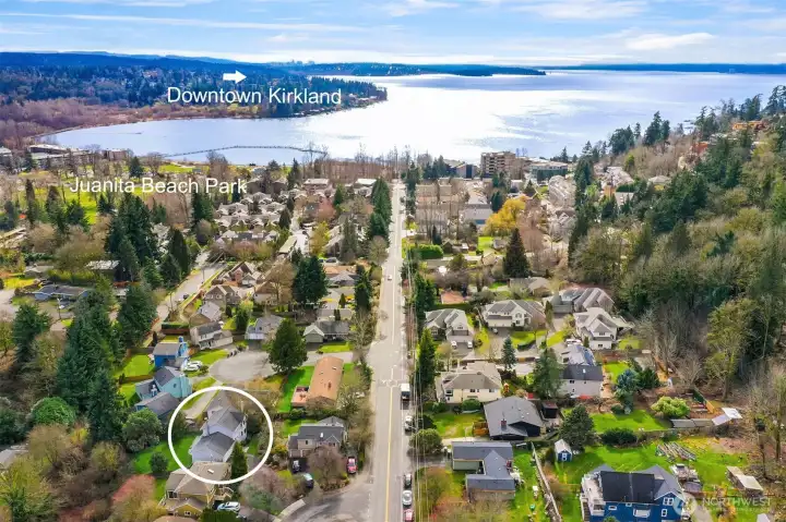 Ideally located in Downtown Juanita, just north of Downtown Kirkland, this northwest contemporary home is tucked in on the south side of a quiet cul-de-sac mere blocks from Lake Washington, Juanita Beach, and Juanita Village.