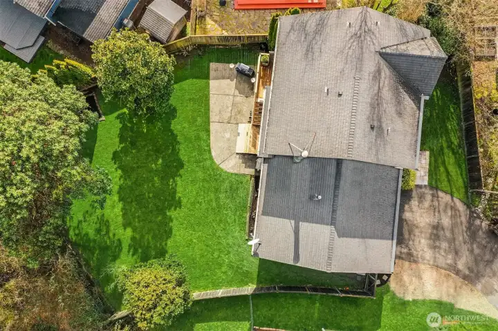 Sited on the south side of a cul-de-sac mere blocks from Juanita Beach, this generous 9,061 square foot lot is fully fenced.  It features a wide patio for cookouts, a deck for morning coffee, an expansive lawn, mature landscaping and serene territorial views.