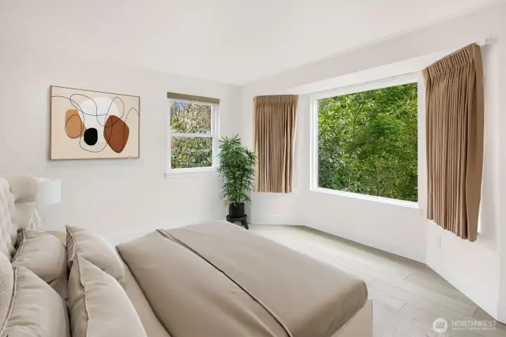 Primary Bedroom Features West-facing Bay Window - Virtually Staged