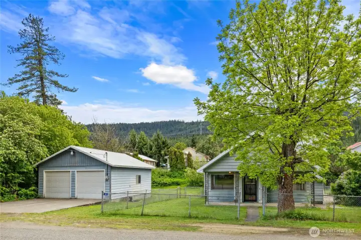 This home is not only iconic but come with a two car detached shop.