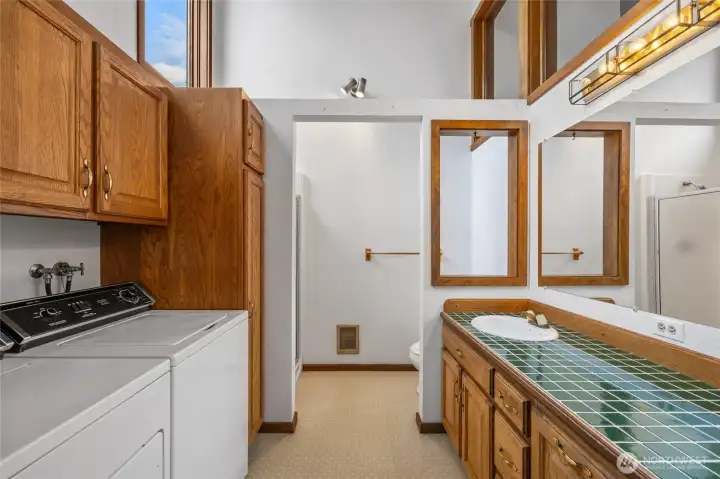 Three quarter bath with laundry room.