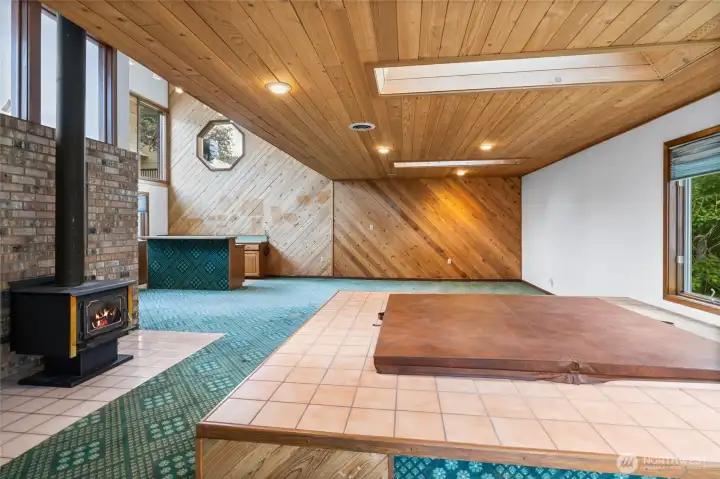 Welcome to the crown jewel —an unforgettable conversation pit meets indoor spa lounge.