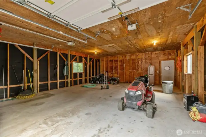 This is the inside of the detached two car garage with automatic garage door openers and plenty of room for all your stuff!