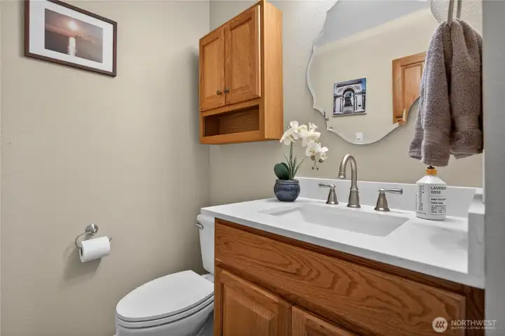 Main floor half bath with a beautiful counter top!