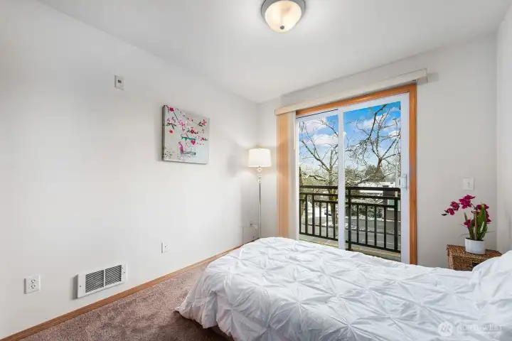 Bedroom #2 faces the building front and offers lots of natural light.