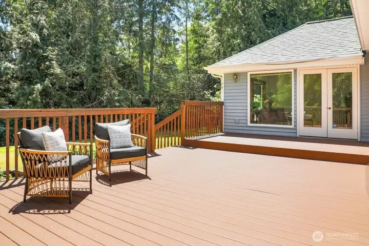 Composite decking for ease and enjoyment on this generously sized southern facing deck.