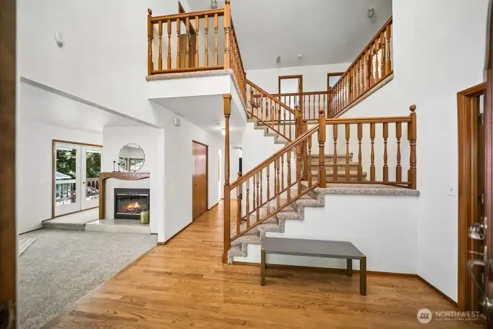 View from home the home office off the entry and stairway to second story bedrooms, bath and recreation room. There's is so much space in this home and a wonderful floor plan as well.