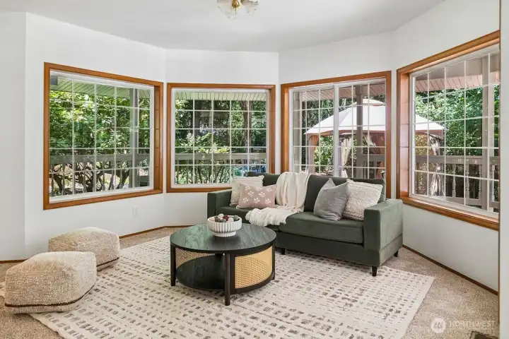 Formal living area just off that amazing pond just outside these windows.