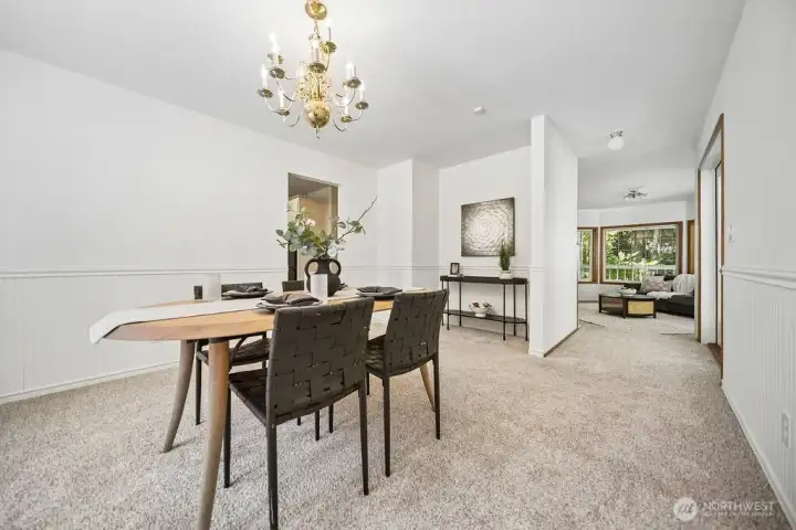 Formal dining to formal living room on right.
