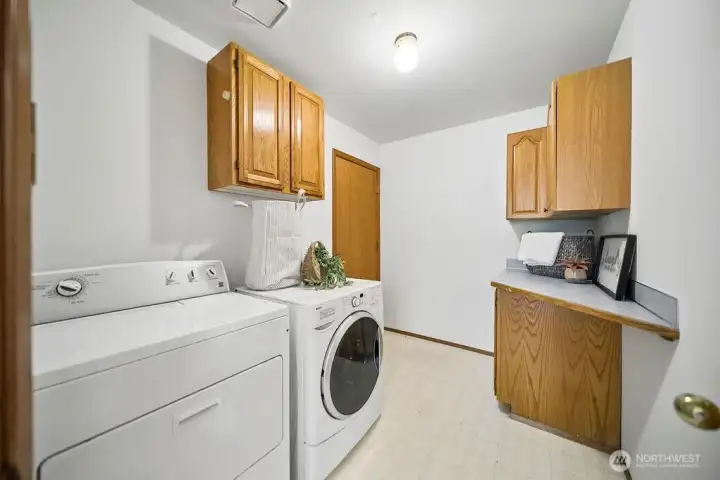 Laundry located between the kitchen and garage.