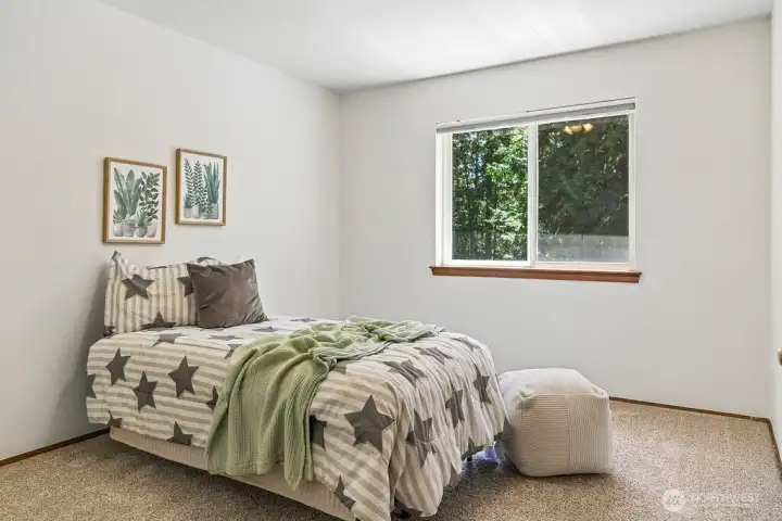 Southern facing 1 of 4 bedrooms.