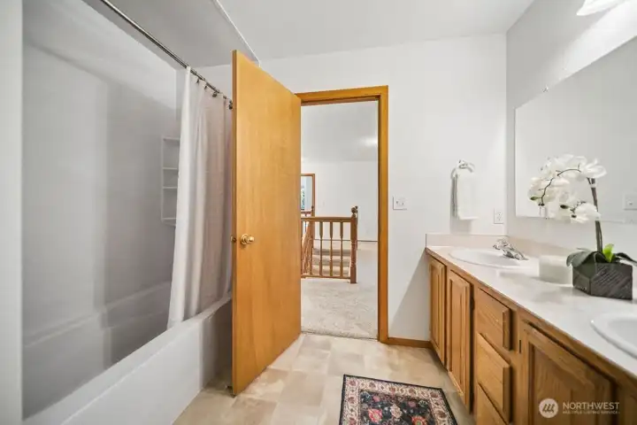 This full bathroom is conveniently situated between the 3 bedrooms on 2nd floor of the home.