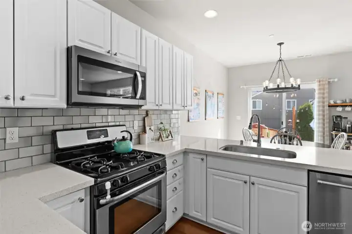 Great tile, backsplash, and quartz countertop Great tile, backsplash, and quartz countertop