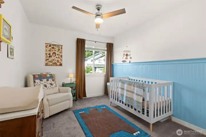 Bedroom three with custom wainscoting Bedroom three with custom wainscoting