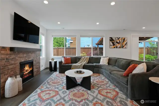he spacious and inviting great room with a cozy gas fireplace to enjoy TV time!