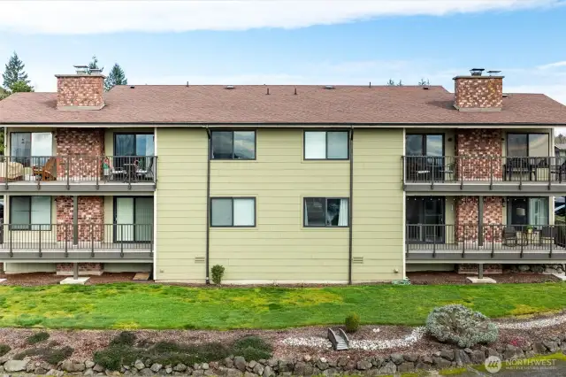 Unit is on the bottom right. The deck, railing and windows are newly installed. The building is on the list for new paint to match the beautiful renovation currently underway
