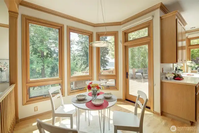 Kitchen dining overlooking patio for extended dining area