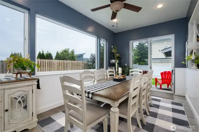 spacious dining room and access to the back yard
