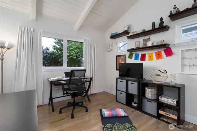 second downstairs bedroom for guests or a bonus room for art studio, yoga, or second office, you can use your imagination.